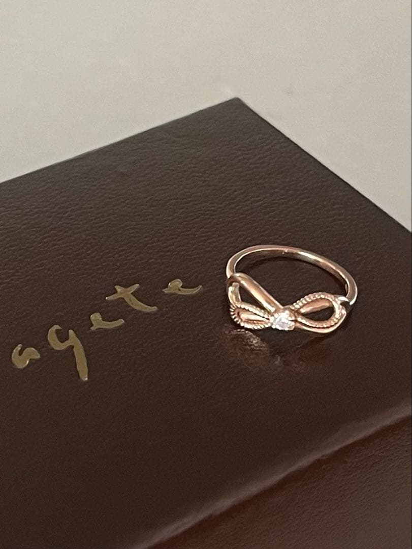 agete ピンキー リング リボン ダイヤモンド 1号 (K10PG) 楽天市場】agete(アガット) ピンキー リング リボン ダイヤモンド 0.03